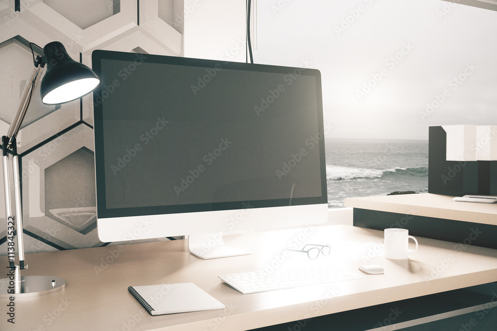 Creative workplace with computer monitor