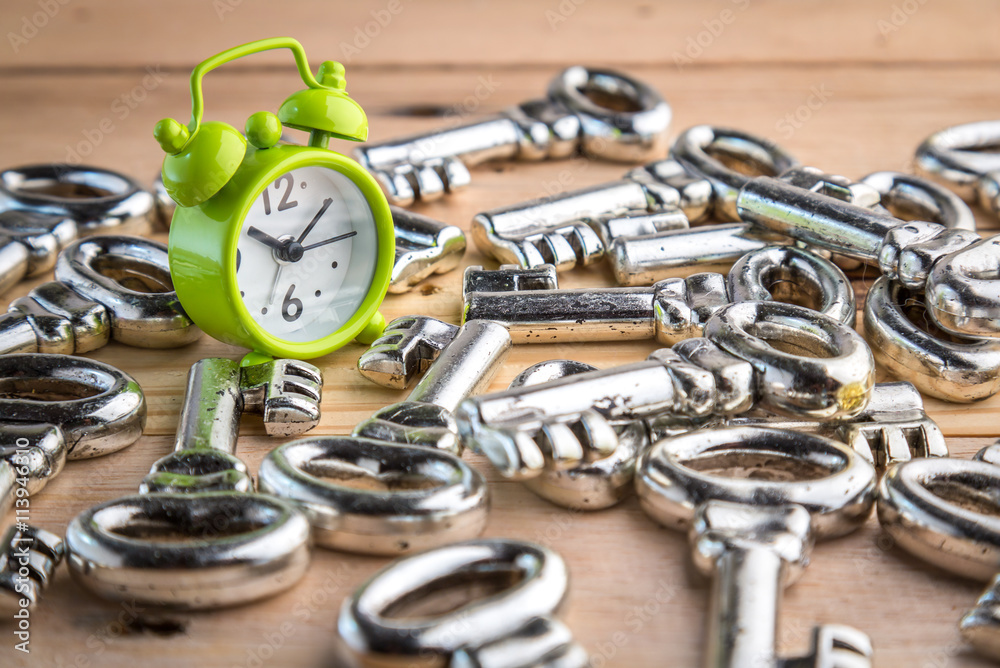 alarm clock and pile of keys