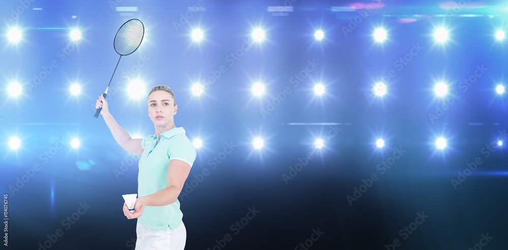 Pretty blonde playing badminton