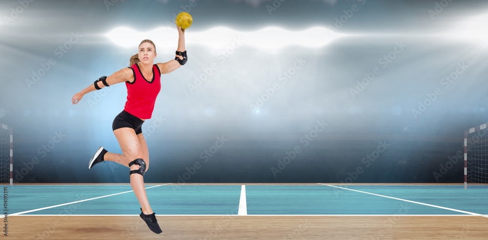 Female athlete with elbow pad throwing handball 