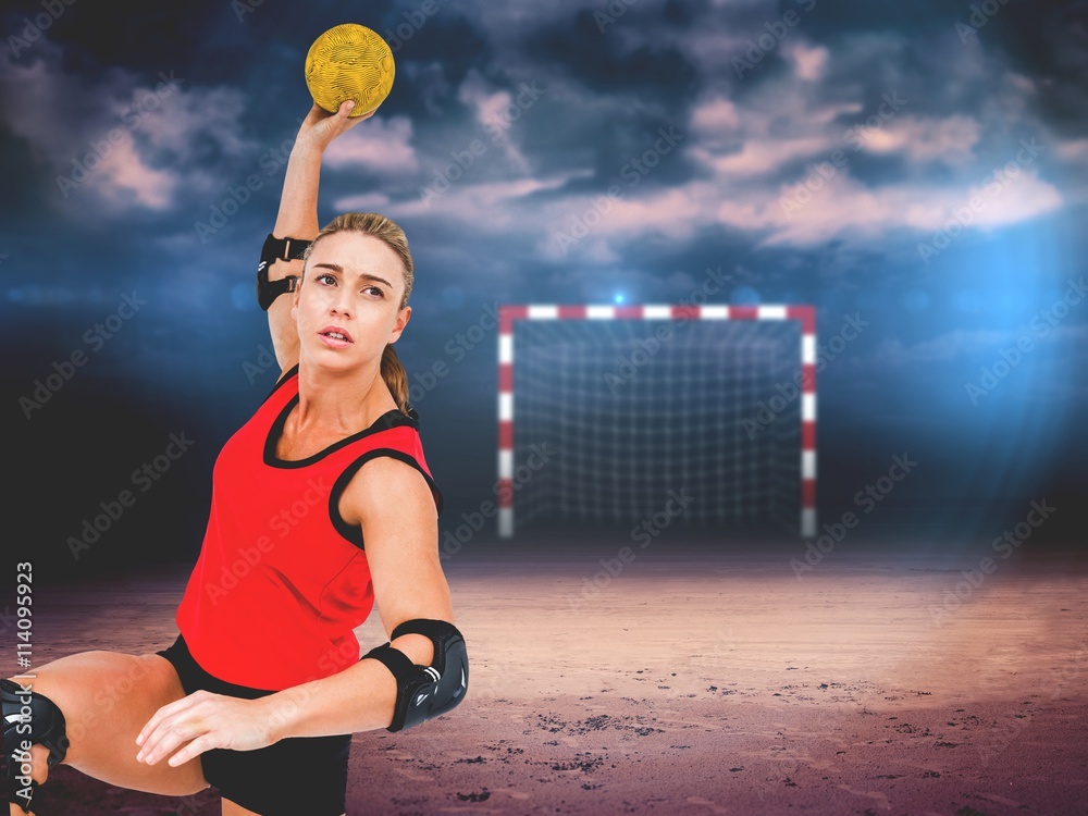 Female athlete throwing handball 