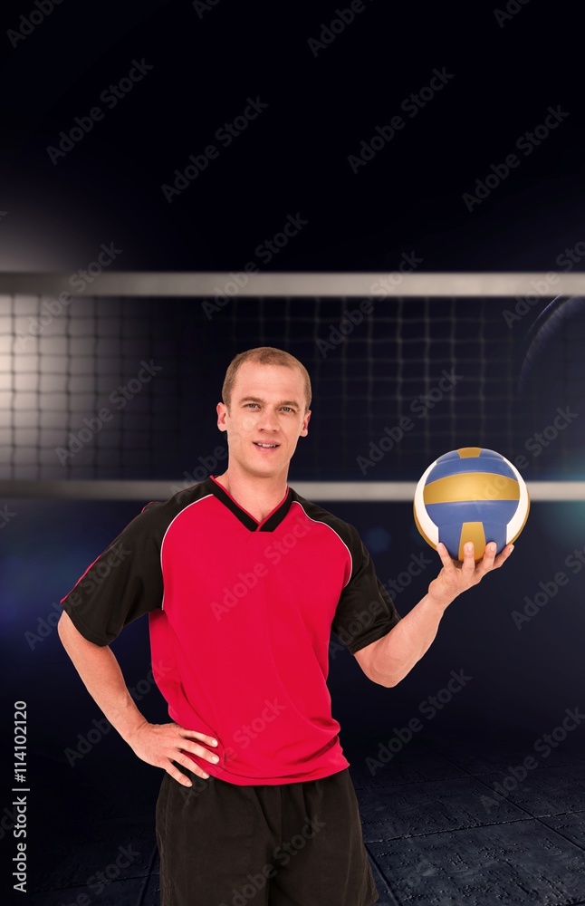 Composite image of sportsman holding a volleyball