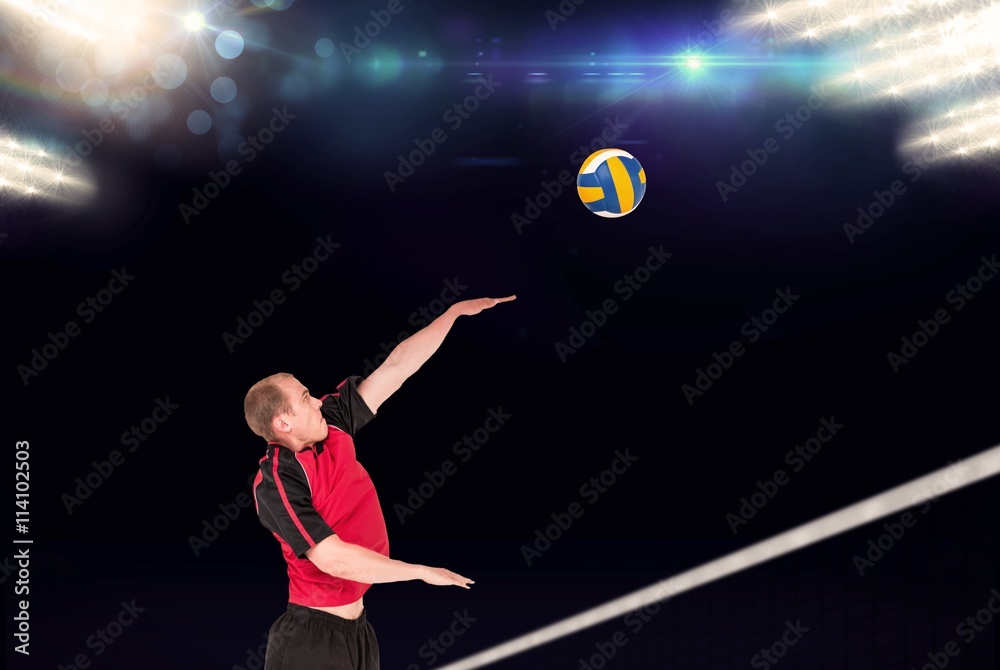 Composite image of sportsman hitting volleyball