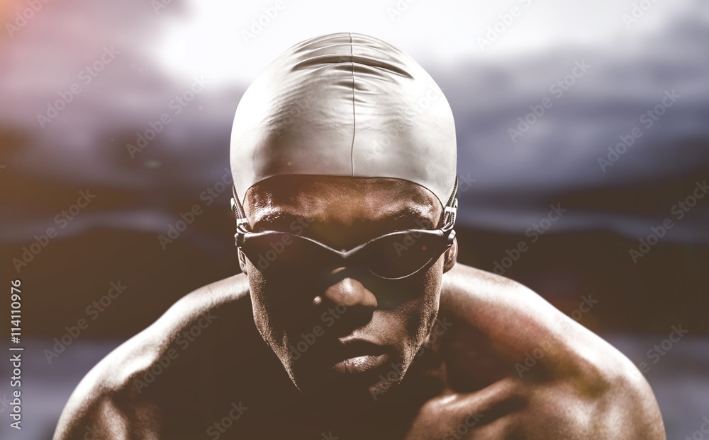 Composite image of swimmer ready to dive