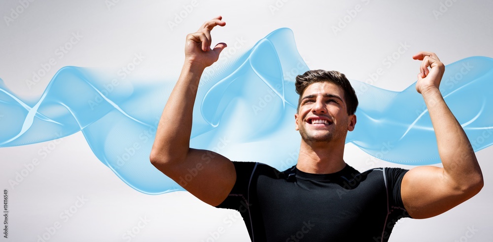 Composite image of portrait of happy sportsman 