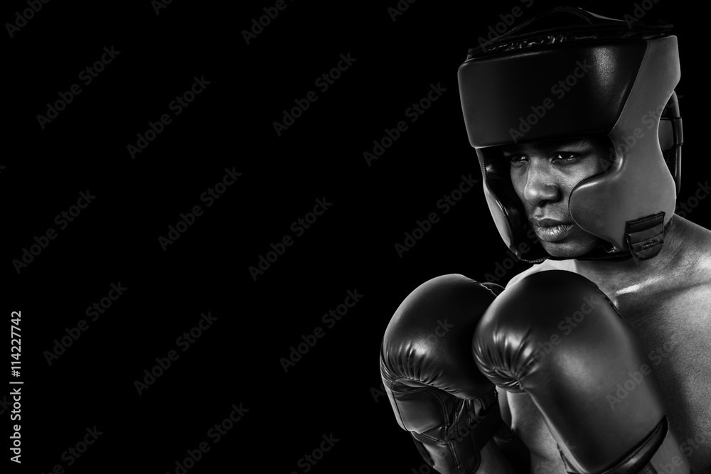 Composite image of boxer performing boxing stance