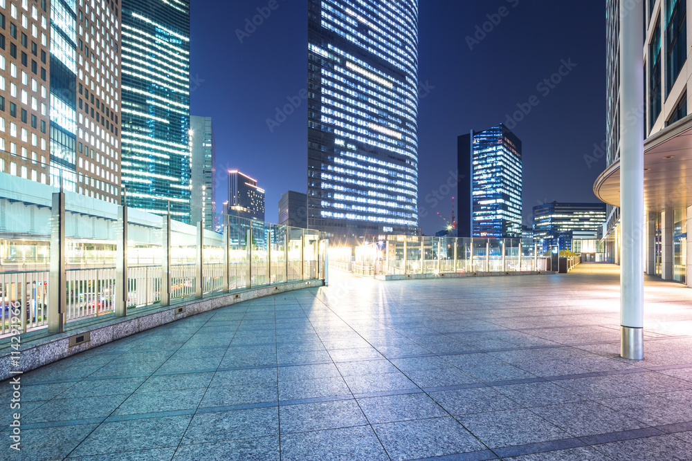 empty floor with modern office buildings in downtown of tokyo at