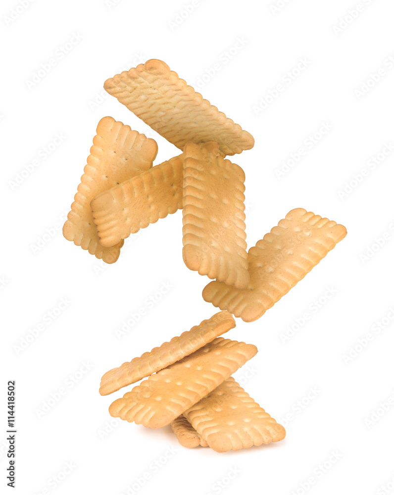 the falling stack of square crackers isolated on white background