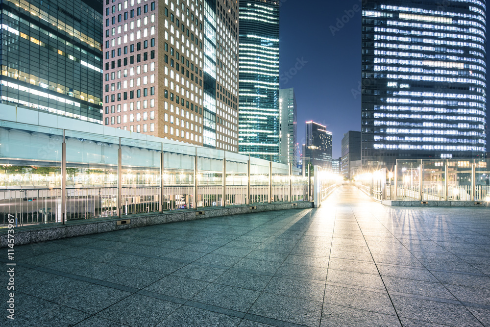 modern office buildings in downtown of tokyo at night