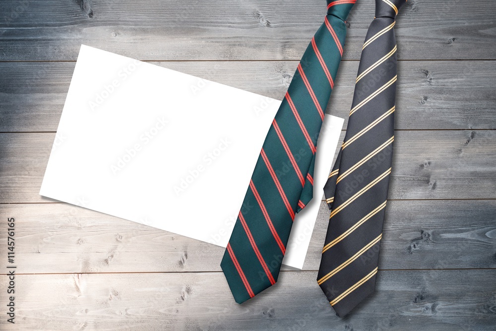 Composite image of blue tie with diagonal line