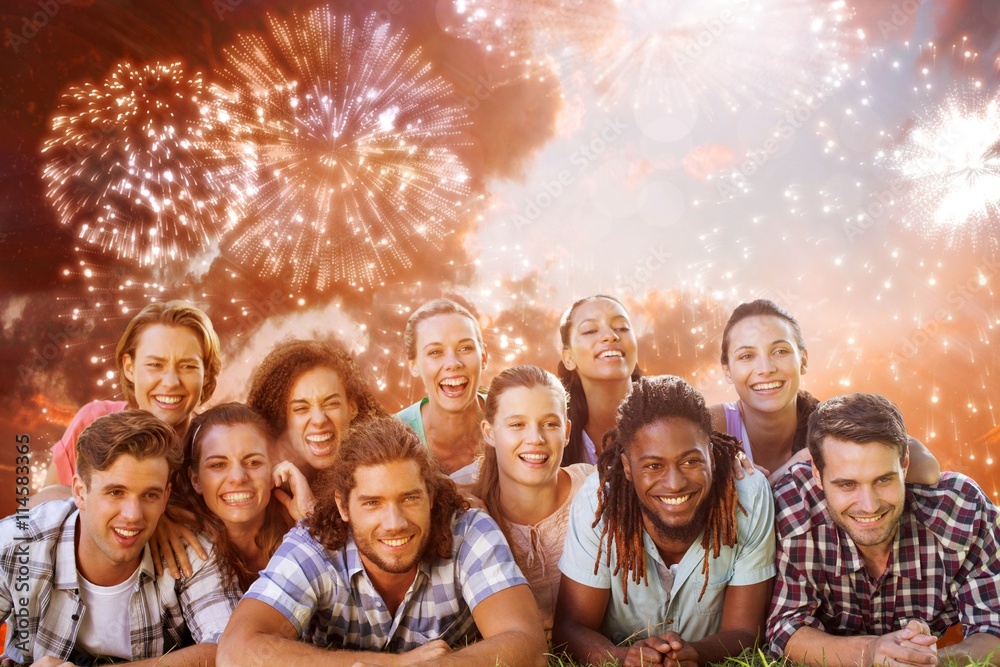 Composite image of happy friends in the park 