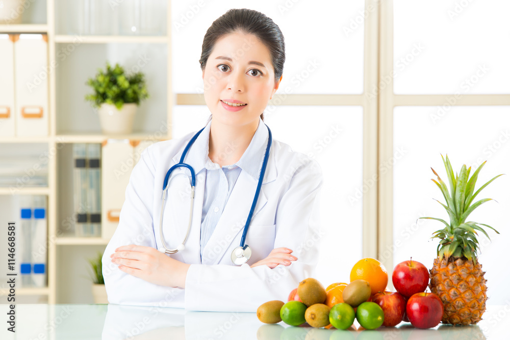 Doctor nutritionist with fruits