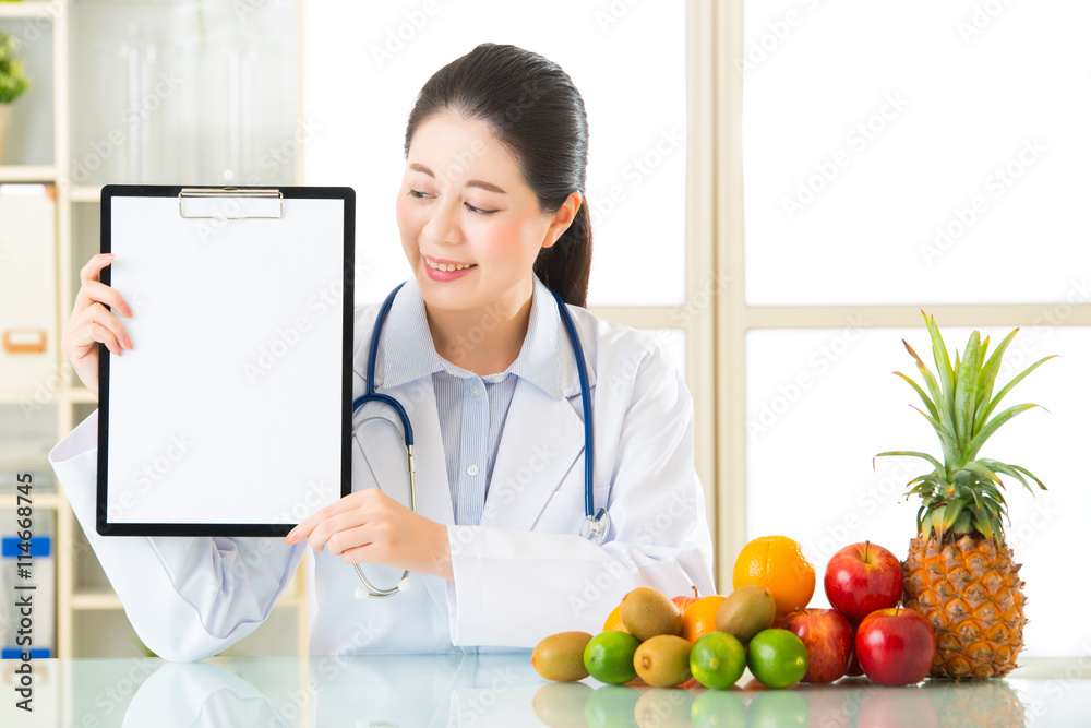 Doctor nutritionist with fruits and vegetable