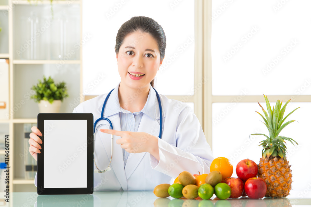 Doctor nutritionist with fruits and vegetable