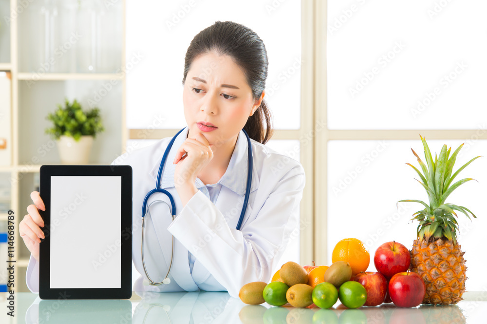 Doctor nutritionist with fruits and vegetable