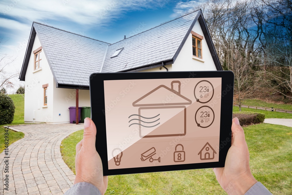 Composite image of cropped hand of man holding digital tablet