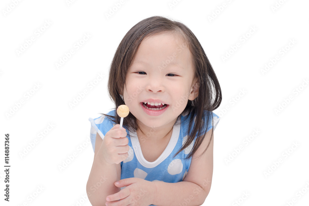 little asian girl holding a lollipop over white