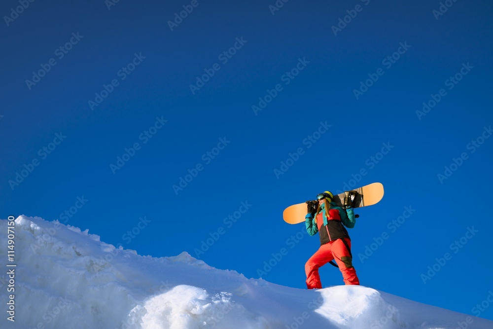 Woman with snowboard