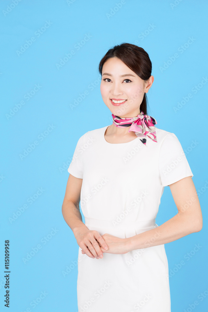 portrait of asian business woman isolated on blue background