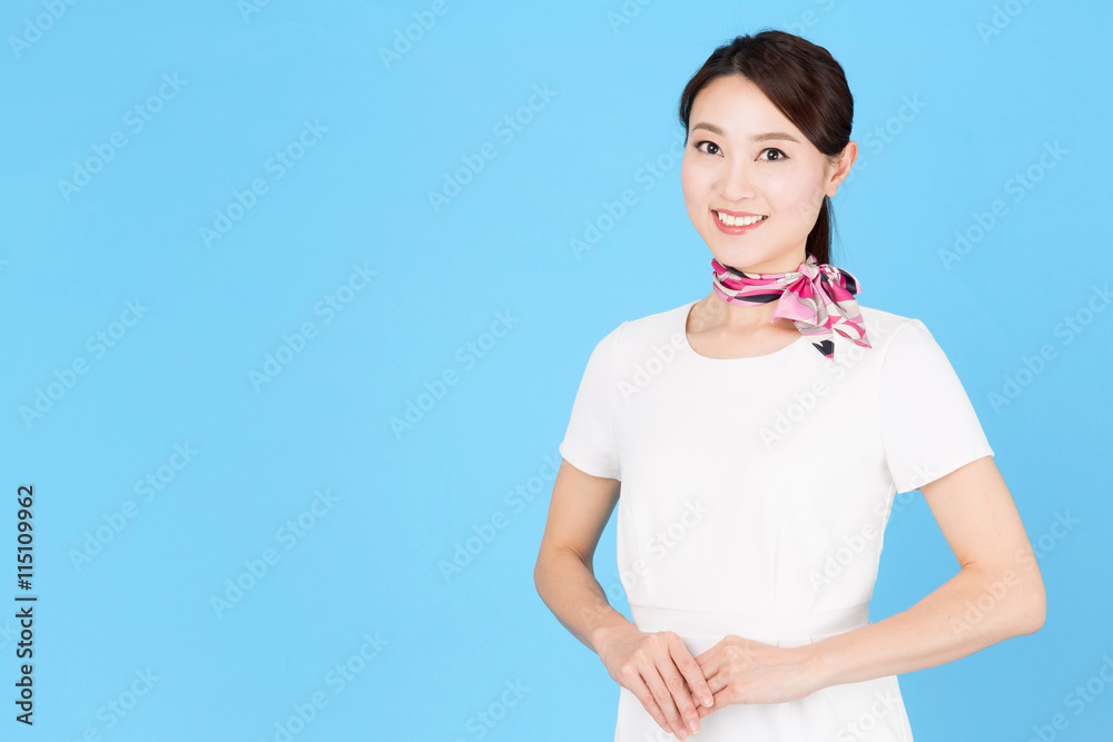 portrait of asian business woman isolated on blue background