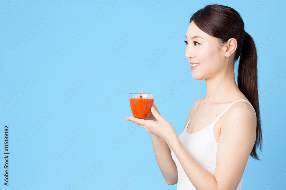 attractive asian woman isolated on blue background