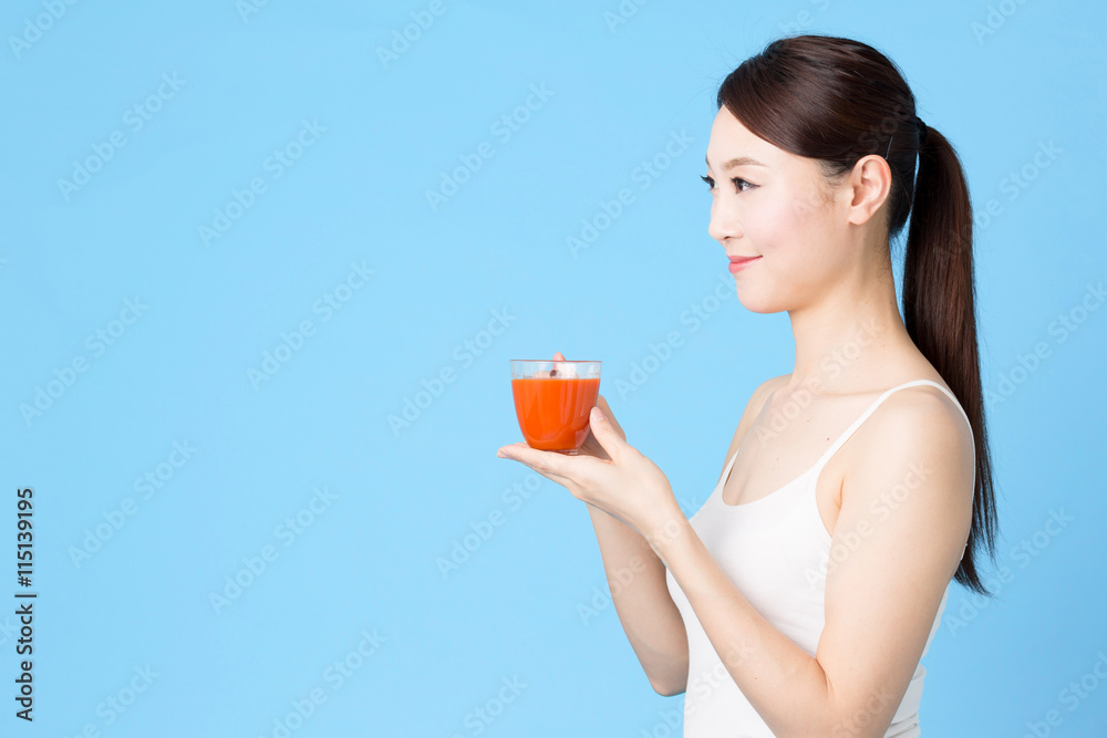 attractive asian woman isolated on blue background