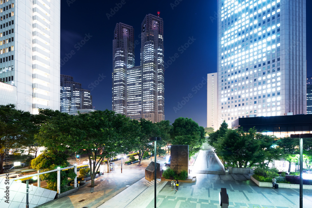 modern office buildings in downtown of tokyo at night