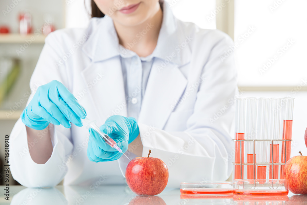 Asian female scientist working on plant biology