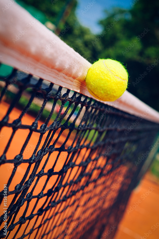 Tennis ball in net