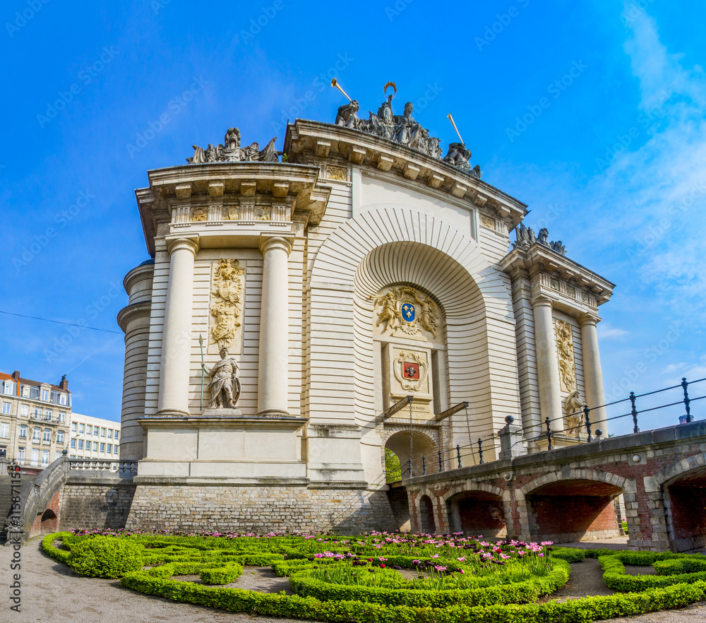 View of french city Lille with belfry, council hall and Paris’ gate