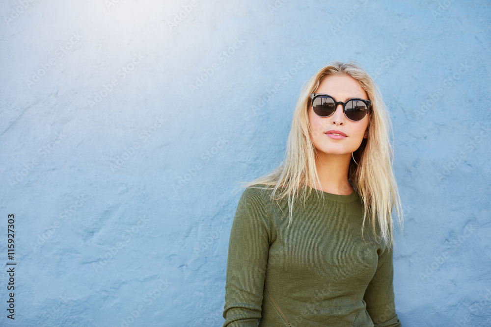 Stylish young female with sunglasses