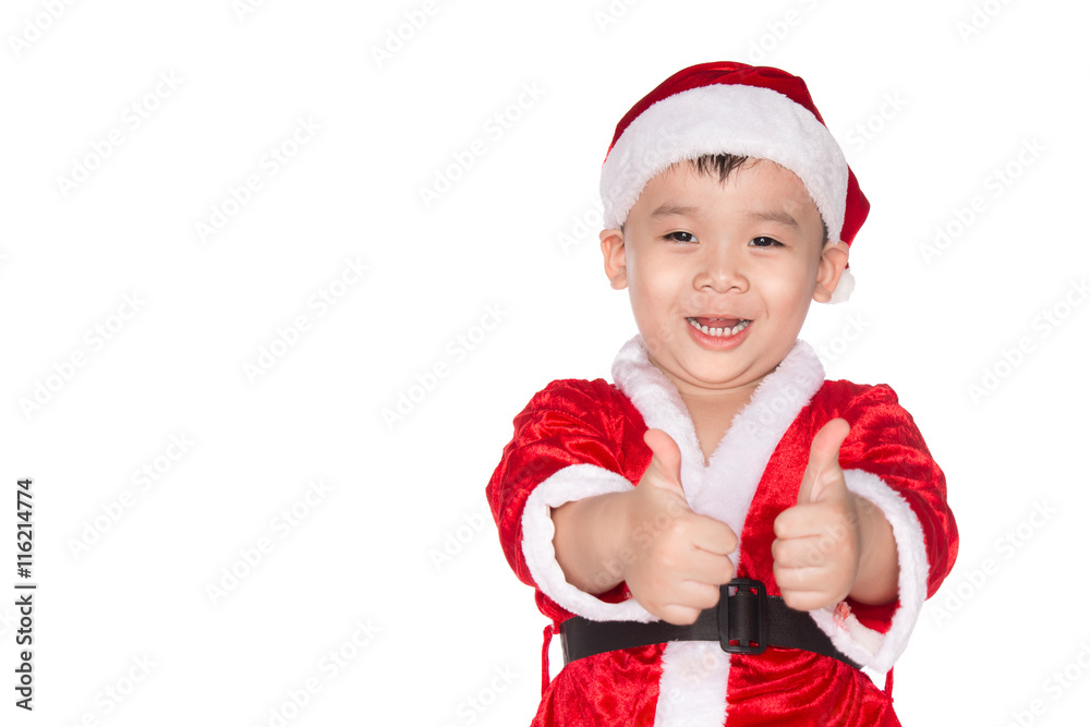 Christmas time - boy with Santa Claus Hat. Young boy as Santa Cl