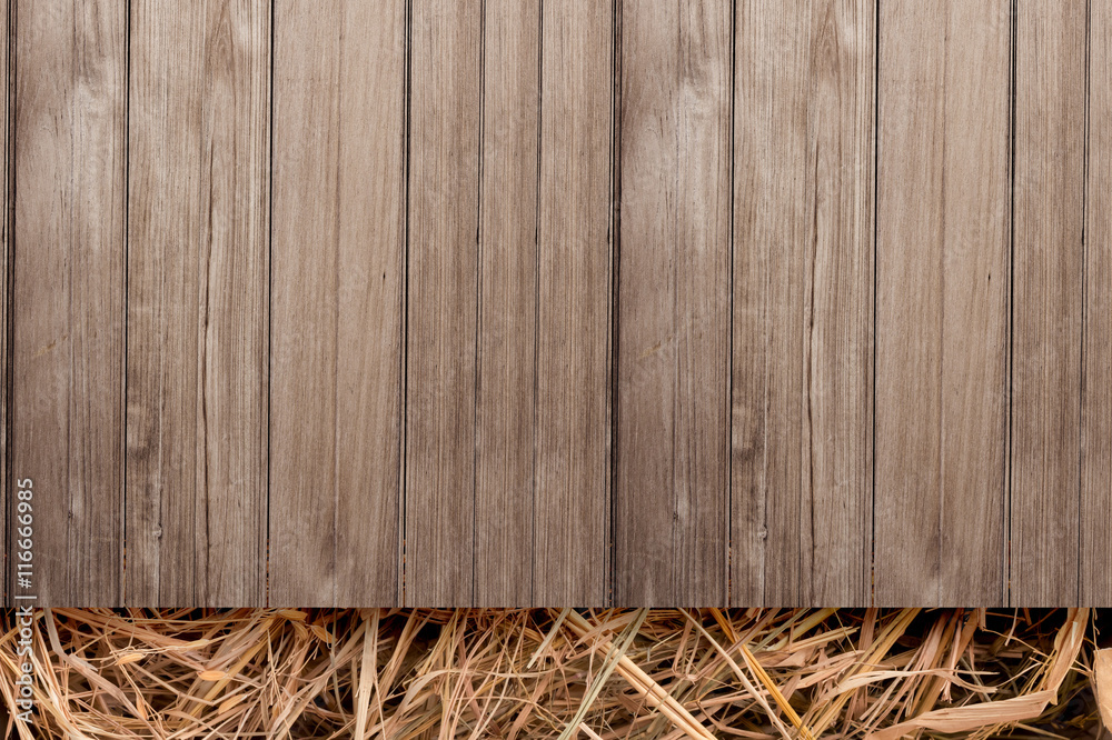 dry old hay with old rustic wooden plank floor top view