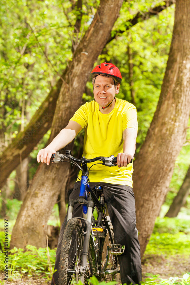 Portrait of active man riding his mountain bike