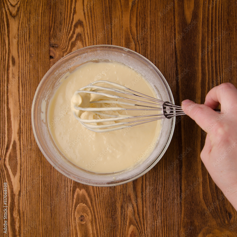 Mixing batter for butter cake or pancake.