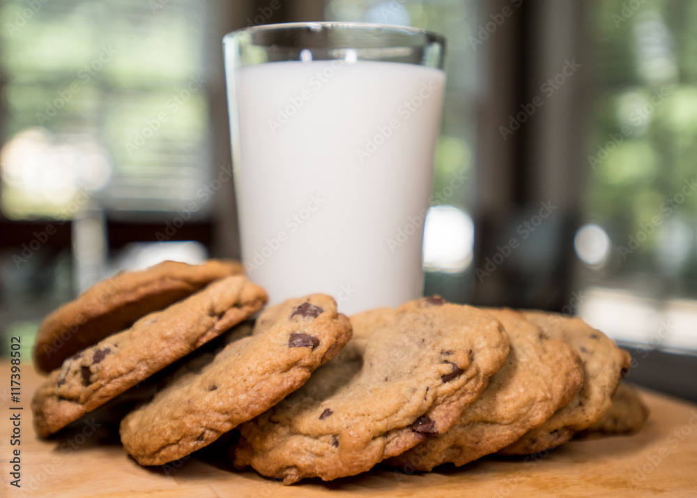 Chocolate Cookies Around a Glass of Milk Horizontal