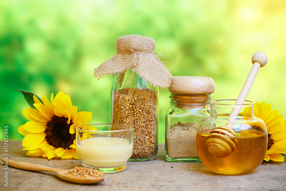 Glass bowls with honey another with pollen and propolis. Honey d