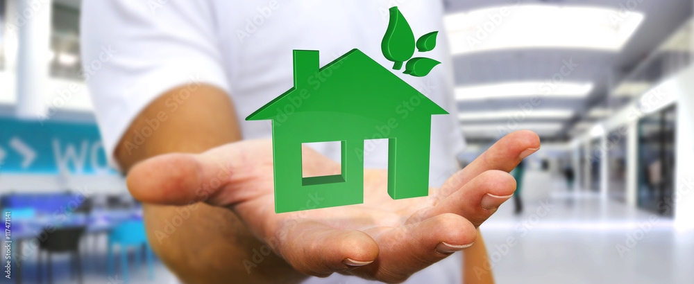 Businessman holding 3D eco house and energy efficiency