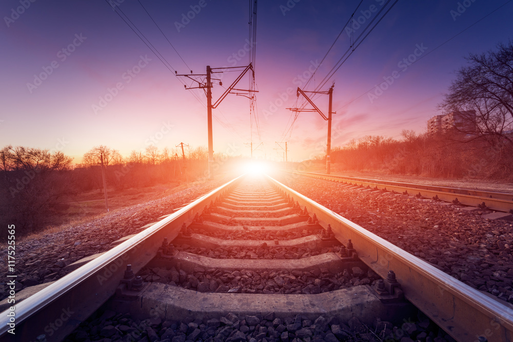 Train platform at sunset. Railroad. Railway station