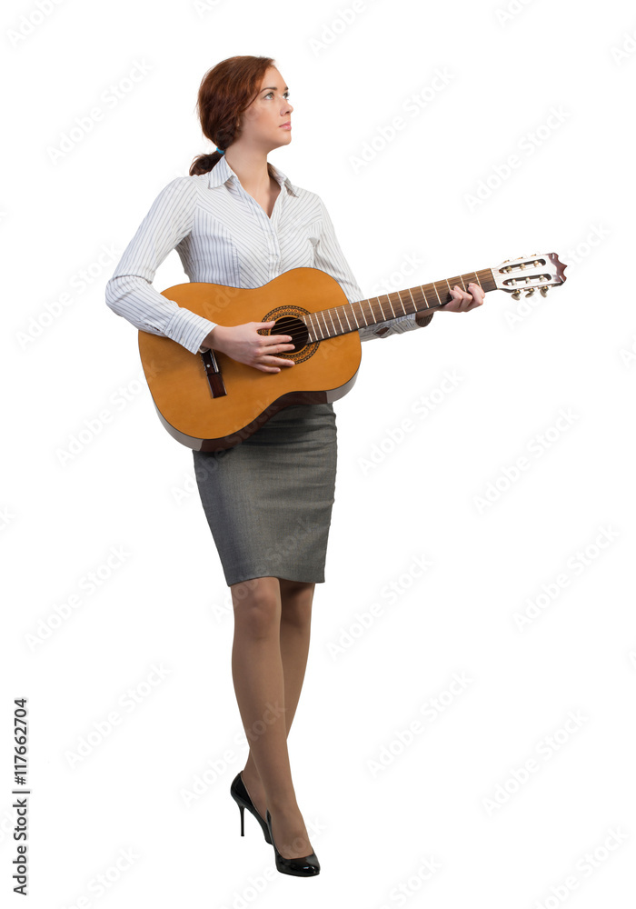 Businesswoman with guitar