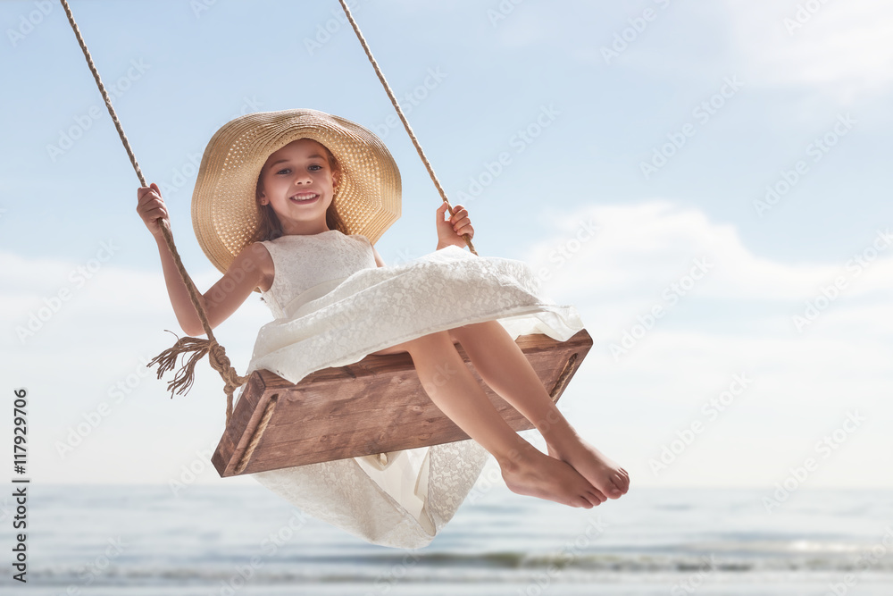 child girl on swing