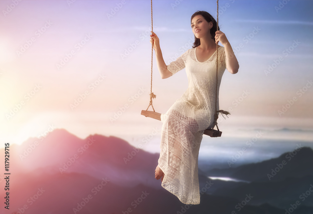 young woman on a swing