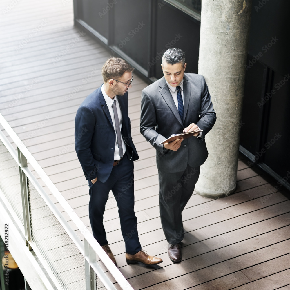 Businessman Walking Discussion Talking Work Concept