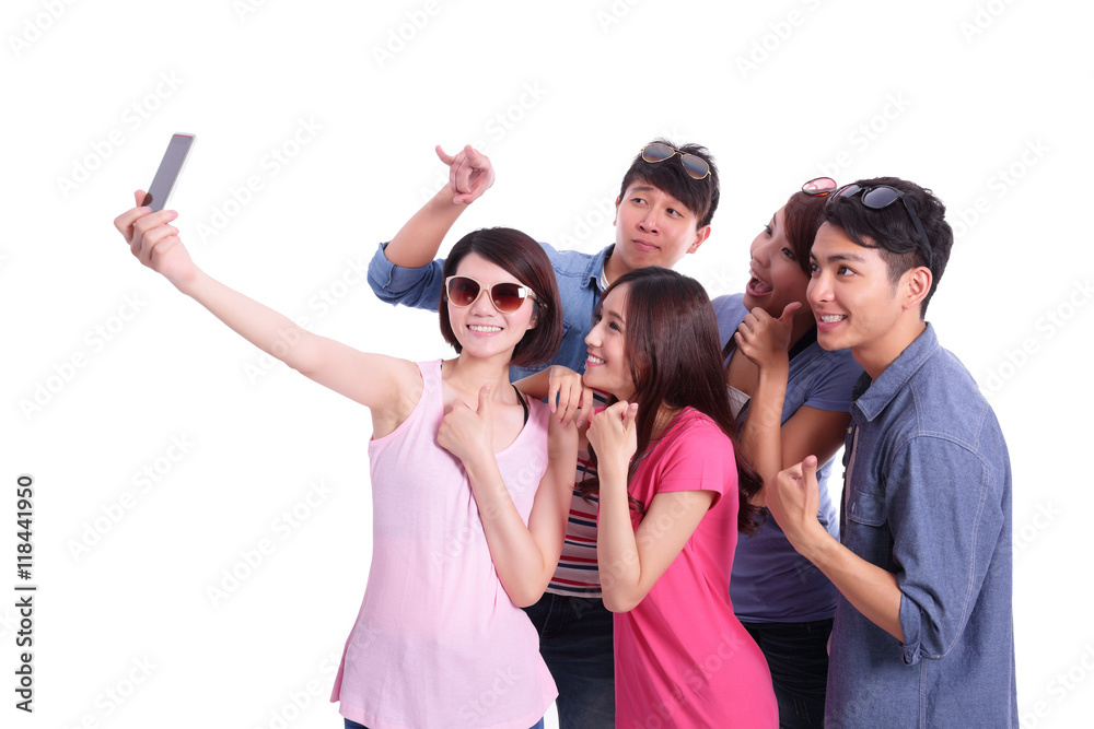 Happy teenagers taking pictures