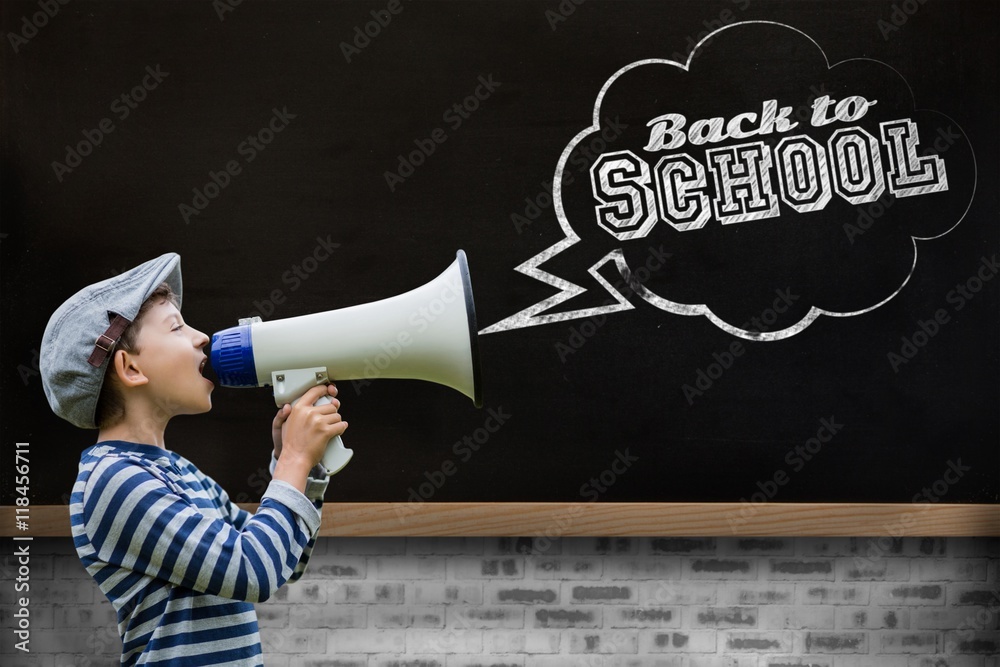 Composite image of boy speaking on megaphone