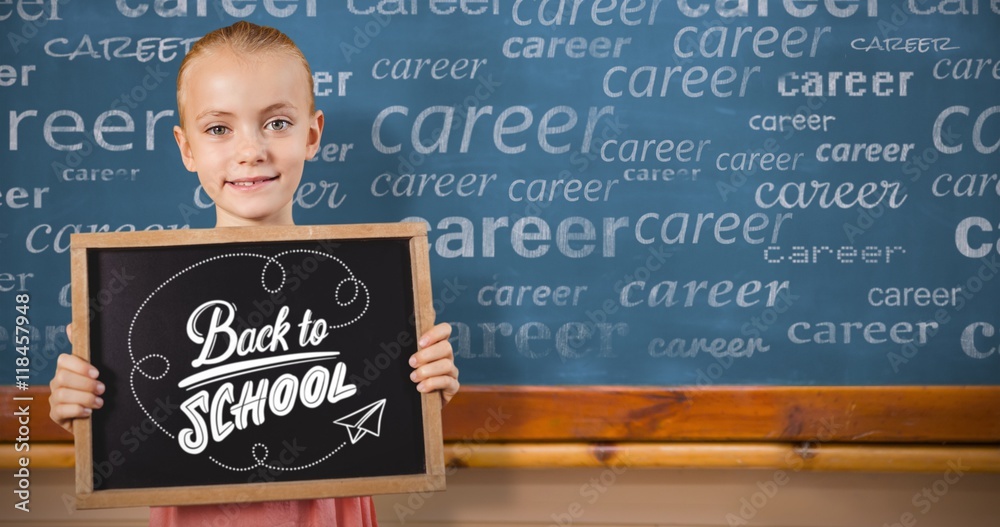 Composite image of girl holding blank blackboard