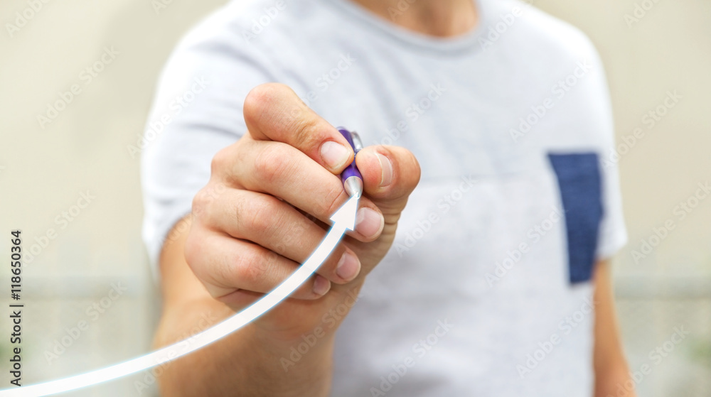 Businessman drawing digital arrow ‘3D rendering’