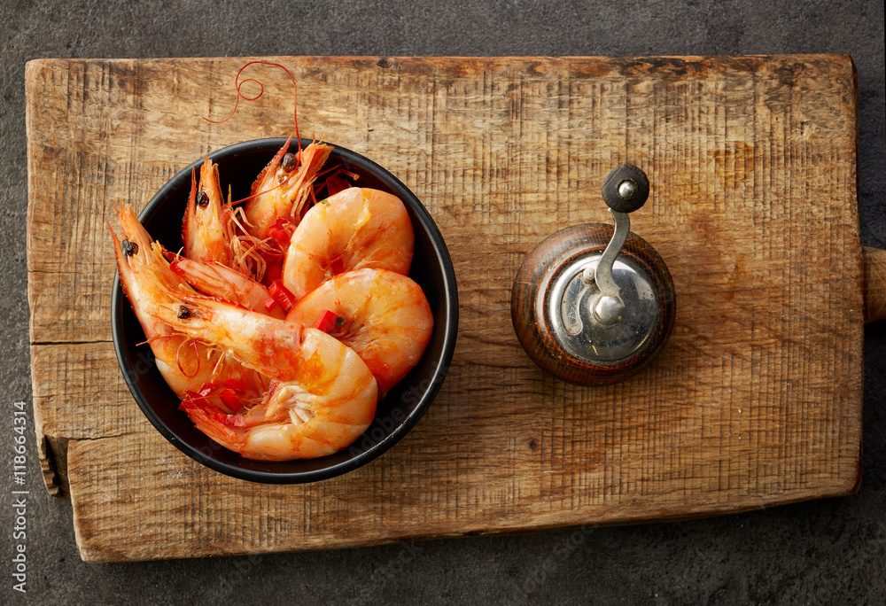 roasted prawns on wooden cutting board