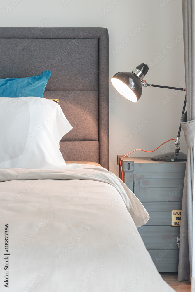 modern black lamp on table side in modern bedroom