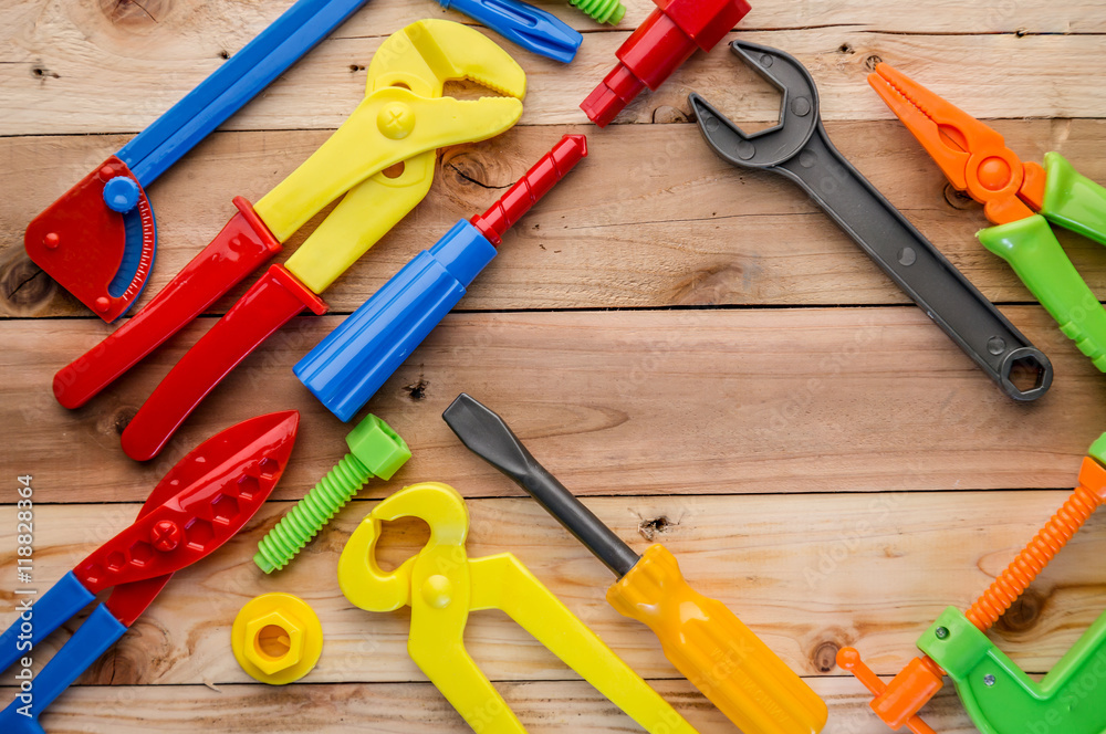  tools and instruments toys on wood texture